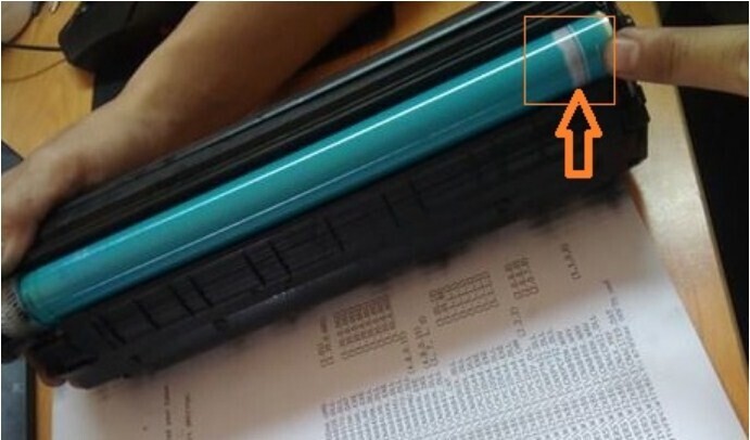 Các lỗi máy in thường gặp, Bản in bị lem mực một bên